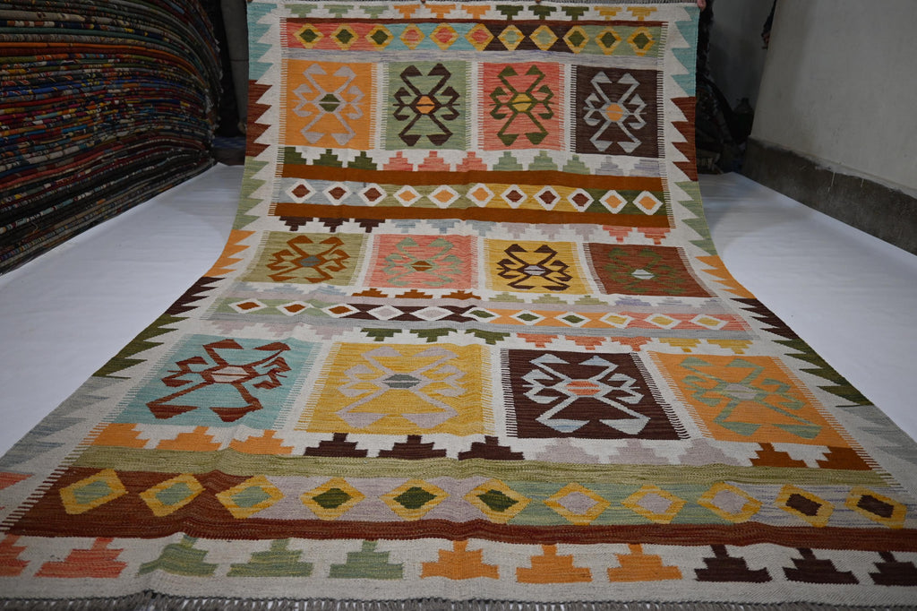 Exquisite Handmade Afghan Kilim Rug: 6x9 Geometric Wool Flatweave for Your Home